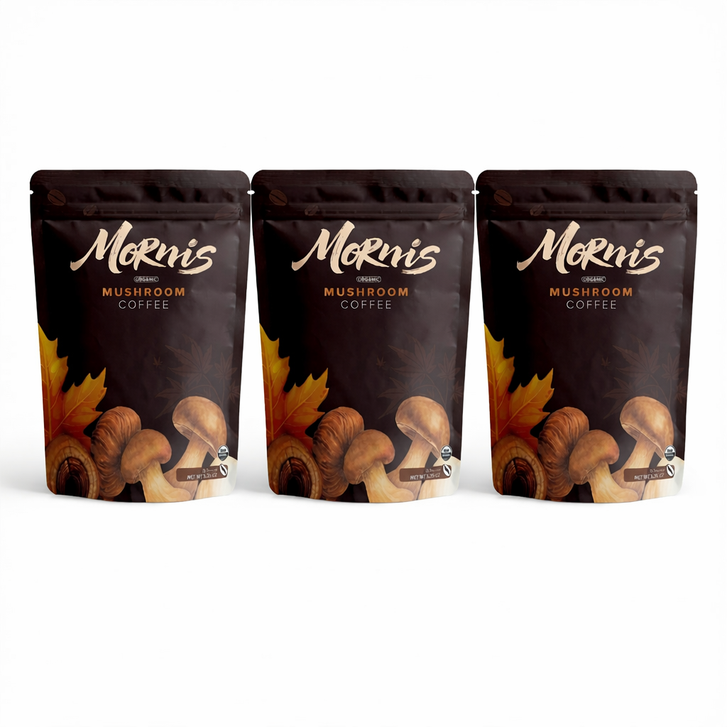 Three packages of Mushroom Coffee on a white background